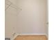 This laundry room features wire shelving and connections for a washer and dryer at 115 Sunderland Cir, Fayetteville, GA 30215