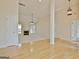 Bright living room featuring neutral carpet, fireplace, ceiling fan, and ample space for entertaining at 115 Sunderland Cir, Fayetteville, GA 30215
