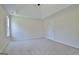 This main bedroom is spacious, with carpet flooring, neutral walls, and a tray ceiling at 115 Sunderland Cir, Fayetteville, GA 30215