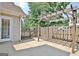 Back patio with pergola, fenced in on back side at 115 Sunderland Cir, Fayetteville, GA 30215