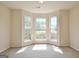 Room showcasing three large windows and neutral carpet for bright natural lighting at 115 Sunderland Cir, Fayetteville, GA 30215