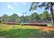 Community tennis courts surrounded by green space, offering a great outdoor activity for residents at 115 Sunderland Cir, Fayetteville, GA 30215