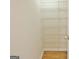 This walk-in closet features wire shelving and neutral walls at 115 Sunderland Cir, Fayetteville, GA 30215