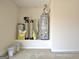 Utility area featuring water heater and filtration system at 115 Sunderland Cir, Fayetteville, GA 30215