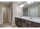 Primary bathroom with double vanity sinks, neutral walls, and ensuite access at 40 Avian Way # 127B, Auburn, GA 30011