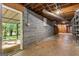 Unfinished basement with concrete floor and exposed ceiling at 115 Club Cir, Stockbridge, GA 30281
