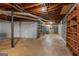 Unfinished basement with concrete floor and exposed ceiling at 115 Club Cir, Stockbridge, GA 30281