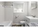 Bathroom featuring a white tiled shower, and mosaic floors at 115 Club Cir, Stockbridge, GA 30281
