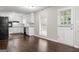 Charming kitchen with white cabinets, modern appliances, and easy access to the outside at 115 Club Cir, Stockbridge, GA 30281