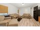 Spacious living room with neutral tones, wood flooring, and comfortable seating at 2031 Dennis Pl, Buford, GA 30519