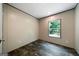 Bedroom with hardwood floor and a window at 273 Ridge Dr, Villa Rica, GA 30180