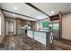 Kitchen area boasts an island, stainless steel appliances, cabinets and hard surface floors throughout at 273 Ridge Dr, Villa Rica, GA 30180