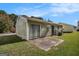 Back of home with small patio and sliding glass door at 5575 Pine Gate Dr, Atlanta, GA 30349