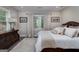 Comfortable bedroom featuring a large window with natural light and neutral tones at 177 Selfridge Rd, Mcdonough, GA 30252