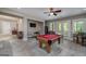 Finished basement game room with pool table, high ceilings, and access to the outdoors at 177 Selfridge Rd, Mcdonough, GA 30252