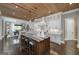 Spacious kitchen features a large center island with seating, custom cabinets, and wood plank ceiling at 177 Selfridge Rd, Mcdonough, GA 30252