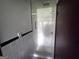 Walk-in shower, tiled walls, black and white mosaic floors at 1511 Walker Ave, Atlanta, GA 30337