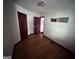 This bedroom features hardwood floors, neutral walls, and classic design elements at 1511 Walker Ave, Atlanta, GA 30337