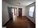 A spacious bedroom with hardwood floors and natural light showcases simple and clean design at 1511 Walker Ave, Atlanta, GA 30337