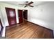 Spacious bedroom with hardwood floors, and view to the hallway at 1511 Walker Ave, Atlanta, GA 30337
