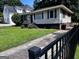 Classic single-story home with a well-maintained lawn and walkway, perfect for comfortable living at 1511 Walker Ave, Atlanta, GA 30337