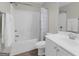 Bathroom featuring a shower-tub combo and vanity with sink at 397 Cypher Dr, Suwanee, GA 30024