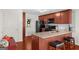 The efficient kitchen features stainless steel appliances, a breakfast bar, and ample counter space at 397 Cypher Dr, Suwanee, GA 30024