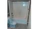 Bright white bathroom with a tub/shower combo at 905 Ohara Dr, Jonesboro, GA 30236