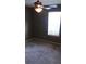 Bedroom with neutral carpet, ceiling fan, and large window at 905 Ohara Dr, Jonesboro, GA 30236