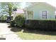 Charming home with a well-maintained lawn and a convenient carport at 905 Ohara Dr, Jonesboro, GA 30236