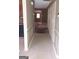 Hallway featuring tile floors and detailed molding at 905 Ohara Dr, Jonesboro, GA 30236