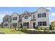 Charming new construction townhomes featuring modern design, well-kept landscaping, and inviting curb appeal at 340 Sound Cir, Stockbridge, GA 30281