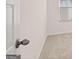Bedroom with neutral walls, carpeted floors, and a window providing natural light at 348 Sound Cir, Stockbridge, GA 30281