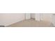 A comfortable bedroom featuring neutral carpet and white walls at 352 Sound Cir, Stockbridge, GA 30281