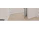 New hallway with carpeted floor and white walls providing a clean and modern look at 352 Sound Cir, Stockbridge, GA 30281