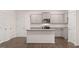 Modern kitchen with stainless steel appliances, granite countertops, and a center island at 352 Sound Cir, Stockbridge, GA 30281
