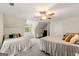 Spacious bedroom with ceiling fan, large windows, and ample space for relaxation and personalization at 4645 Villa Ridge Ne Rd, Marietta, GA 30068
