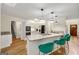 Bright kitchen with stainless steel appliances, granite countertops, an island with seating, and lots of natural light at 4645 Villa Ridge Ne Rd, Marietta, GA 30068
