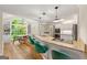 Modern kitchen with granite countertops, island seating, stainless appliances, and eat in nook at 4645 Villa Ridge Ne Rd, Marietta, GA 30068