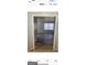 Bright bedroom with hardwood flooring and view of the natural light from the window at 4634 Bexley Dr, Stone Mountain, GA 30083