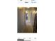 Hallway with carpet floors and multiple doors, enhancing functionality and accessibility at 4634 Bexley Dr, Stone Mountain, GA 30083