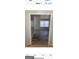Bright living room featuring new floors and a large window that provides ample natural light at 4634 Bexley Dr, Stone Mountain, GA 30083