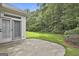 This home has a concrete back patio overlooking the private and wooded backyard at 2118 Cherry Tree Ln, Peachtree City, GA 30269