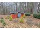 A community brick and iron sign with manicured landscaping and pine straw at 2118 Cherry Tree Ln, Peachtree City, GA 30269