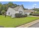 A lovely single story home features well-maintained landscaping and a traditional design at 2118 Cherry Tree Ln, Peachtree City, GA 30269