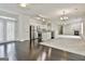 Spacious living room with an open floor plan and stainless steel appliances at 2118 Cherry Tree Ln, Peachtree City, GA 30269