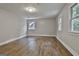 Spacious bedroom featuring natural light and hardwood flooring at 270 Carrolls Way, Fayetteville, GA 30215