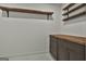 Walk-in closet with built-in shelves and drawers at 270 Carrolls Way, Fayetteville, GA 30215