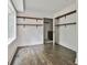 Walk-in closet with built in shelves, drawers, and white walls at 270 Carrolls Way, Fayetteville, GA 30215