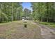 Charming exterior view of home and garage, surrounded by a lush, green treeline at 270 Carrolls Way, Fayetteville, GA 30215